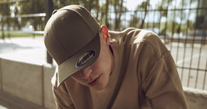 Why We Recommend Yupoong for Custom Embroidered Headwear.