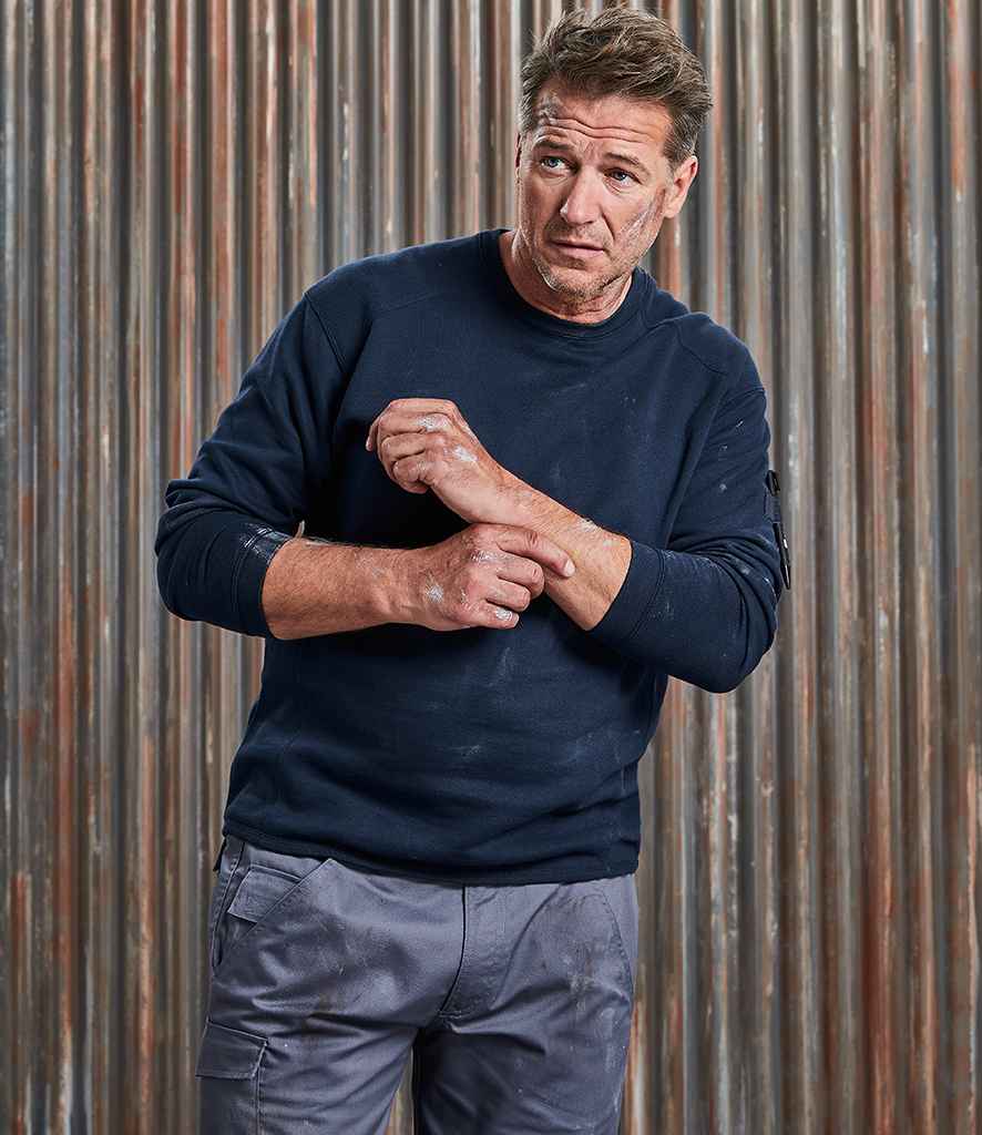 Russell Heavyweight Sweatshirt in by Russell — Custom branded clothing by Print Press, featuring premium embroidery produced in our specialist print lab in the UK.
