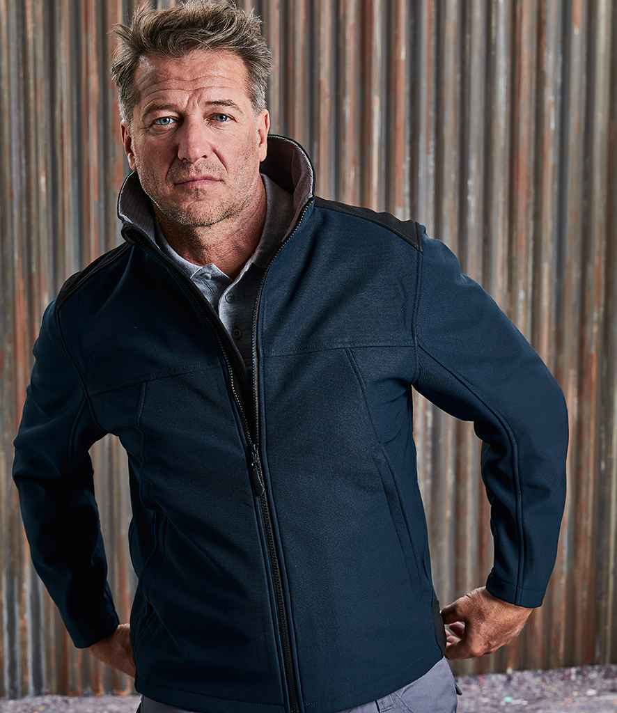 Russell Soft Shell Workwear Jacket in Black by Russell — Custom branded clothing by Print Press, featuring premium embroidery produced in our specialist print lab in the UK.