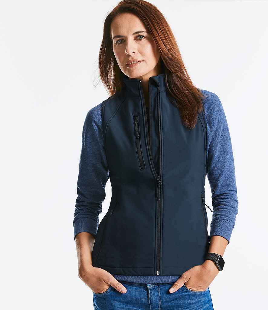 Russell Ladies Soft Shell Gilet in French Navy by Russell — Custom branded clothing by Print Press, featuring premium embroidery produced in our specialist print lab in the UK.