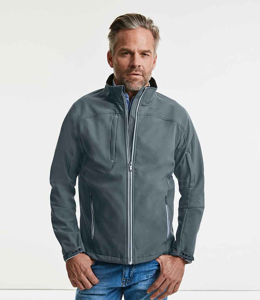 Russell Bionic Soft Shell Jacket in Iron by Russell — Custom branded clothing by Print Press, featuring premium embroidery produced in our specialist print lab in the UK.