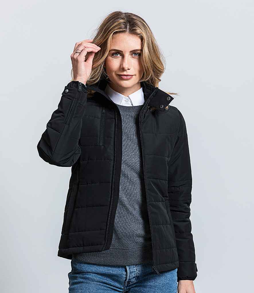 Russell Ladies Cross Padded Jacket in Black by Russell — Custom branded clothing by Print Press, featuring premium embroidery produced in our specialist print lab in the UK.