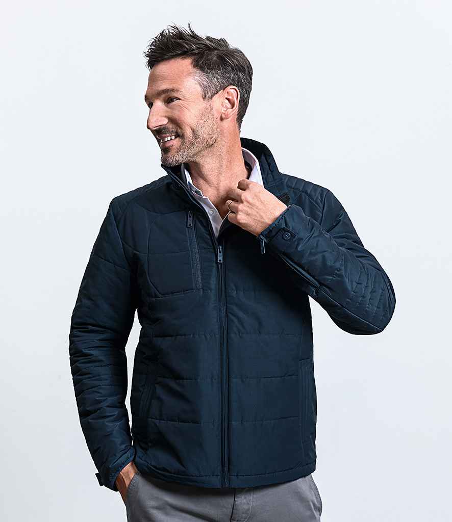Russell Cross Padded Jacket in by Russell — Custom branded clothing by Print Press, featuring premium embroidery produced in our specialist print lab in the UK.