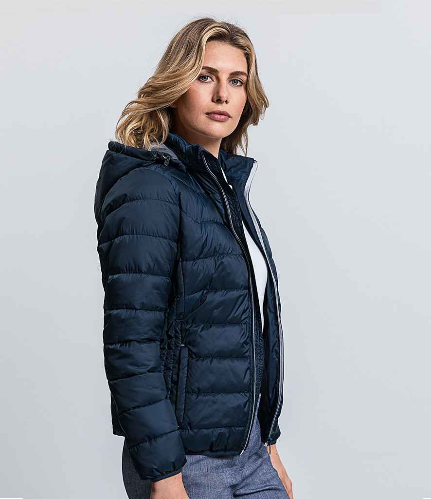 Russell Ladies Hooded Nano Padded Jacket in French Navy by Russell — Custom branded clothing by Print Press, featuring premium embroidery produced in our specialist print lab in the UK.