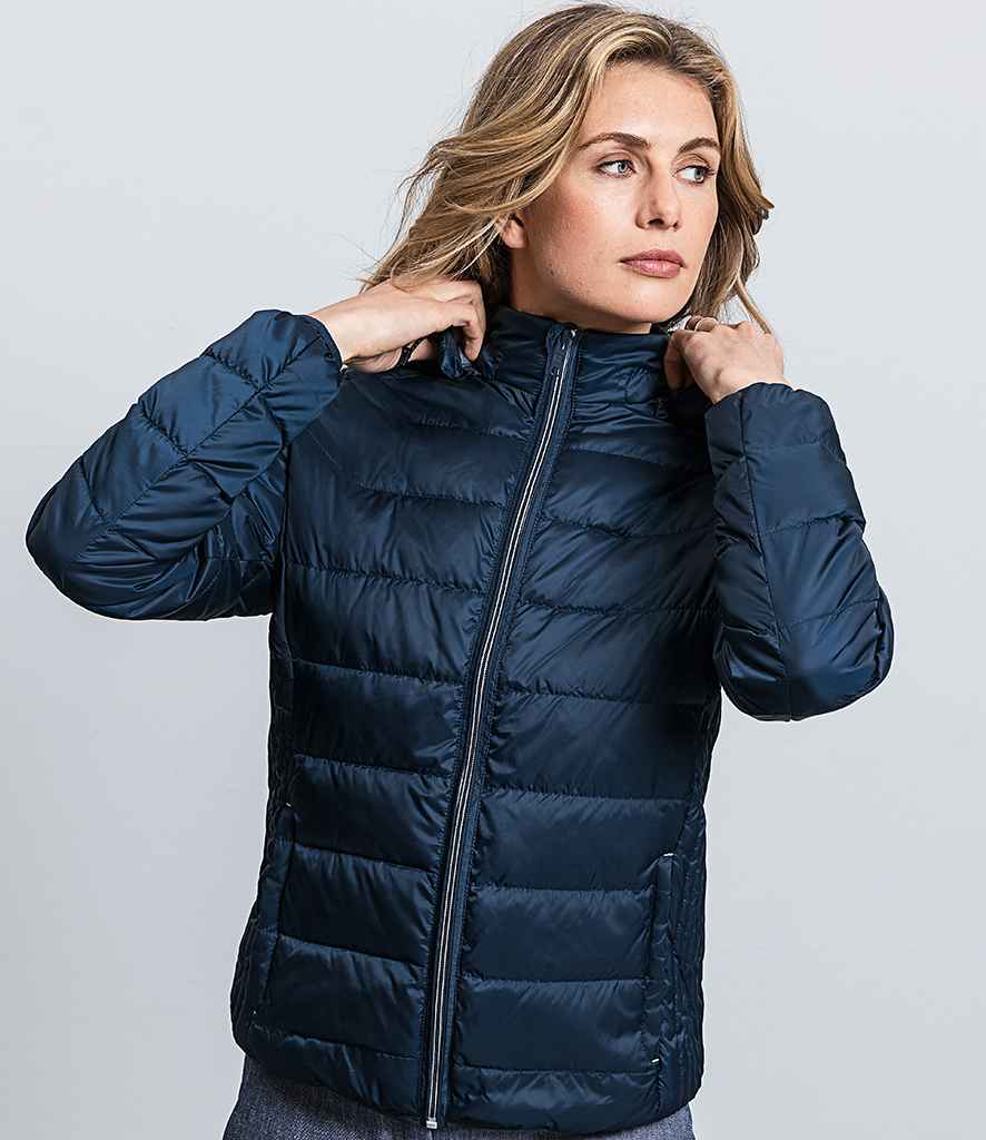 Russell Ladies Hooded Nano Padded Jacket in by Russell — Custom branded clothing by Print Press, featuring premium embroidery produced in our specialist print lab in the UK.
