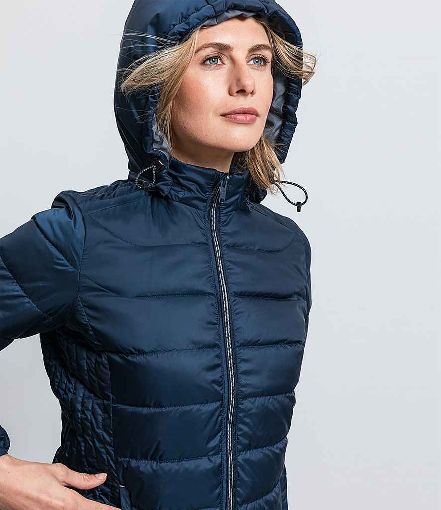 Russell Ladies Hooded Nano Padded Jacket in by Russell — Custom branded clothing by Print Press, featuring premium embroidery produced in our specialist print lab in the UK.