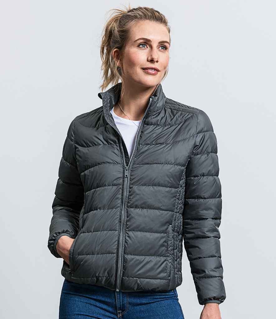 Russell Ladies Hooded Nano Padded Jacket in Iron by Russell — Custom branded clothing by Print Press, featuring premium embroidery produced in our specialist print lab in the UK.