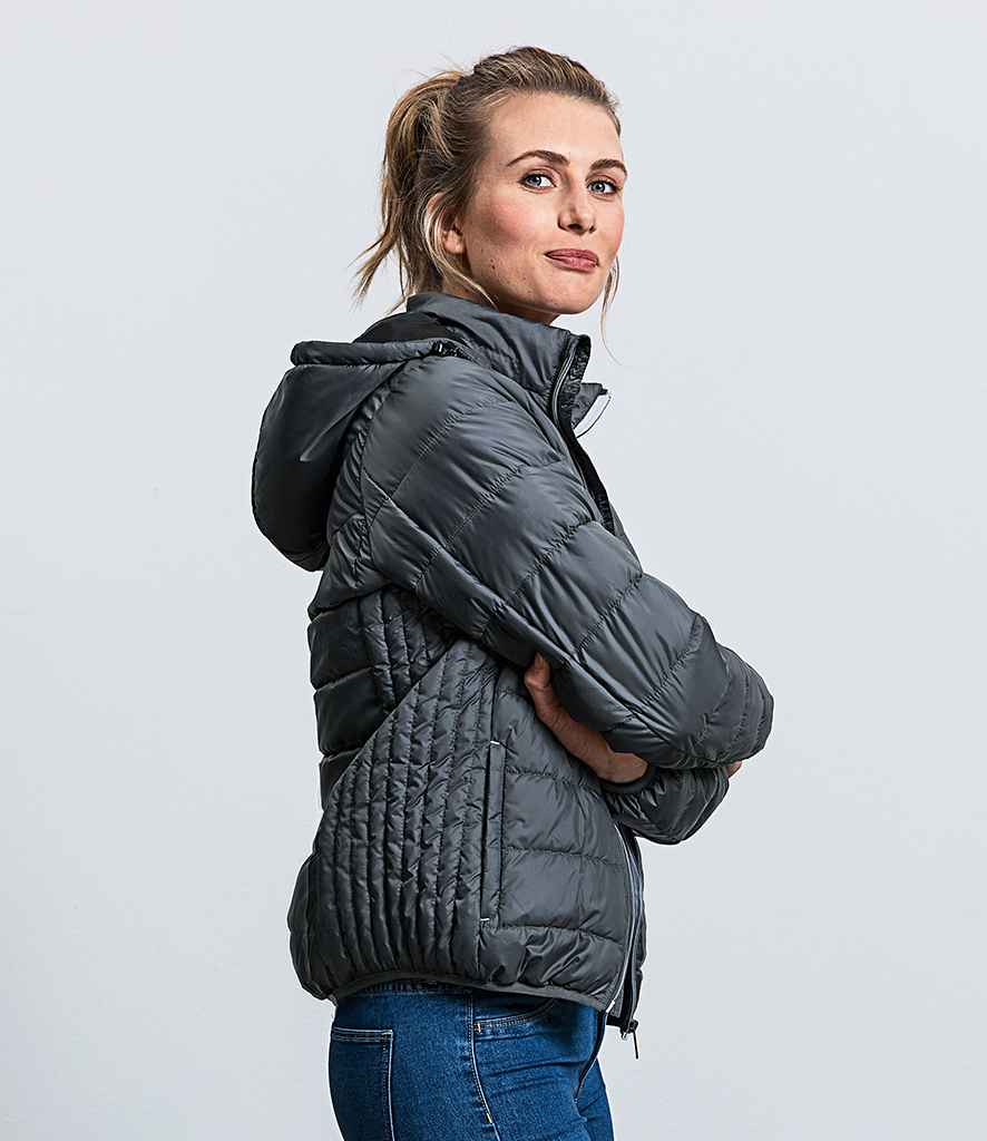 Russell Ladies Hooded Nano Padded Jacket in by Russell — Custom branded clothing by Print Press, featuring premium embroidery produced in our specialist print lab in the UK.