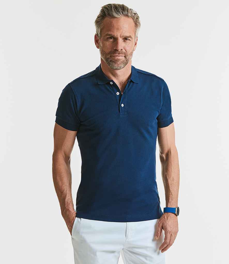 Russell Stretch Piqué Polo Shirt in French Navy by Russell — Custom branded clothing by Print Press, featuring premium embroidery produced in our specialist print lab in the UK.