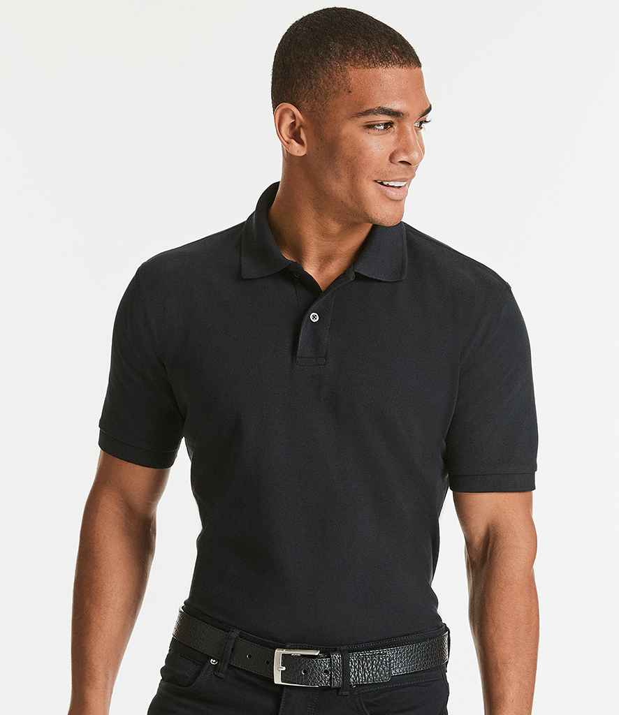 Russell Classic Cotton Piqué Polo Shirt in Black by Russell — Custom branded clothing by Print Press, featuring premium embroidery produced in our specialist print lab in the UK.