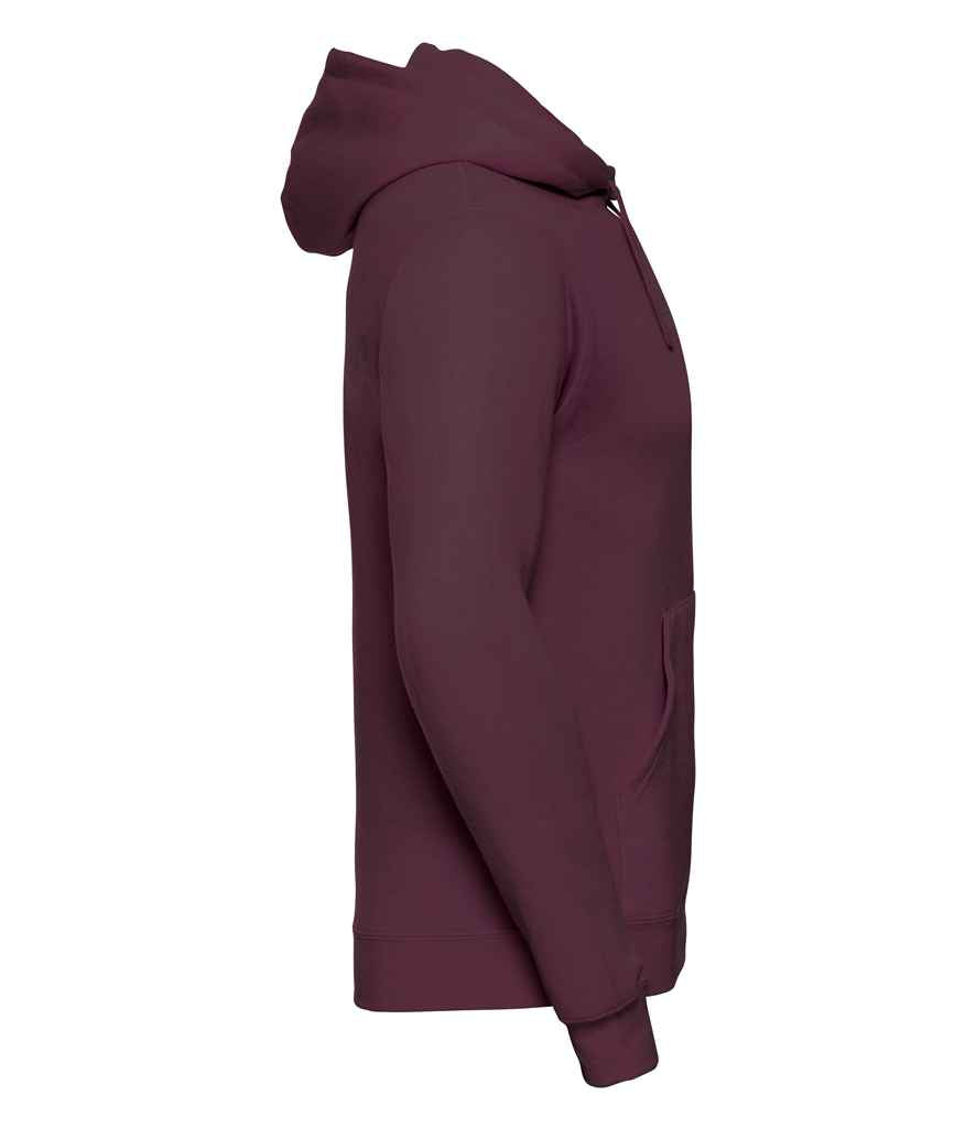 Russell Hooded Sweatshirt in by Russell — Custom branded clothing by Print Press, featuring premium embroidery produced in our specialist print lab in the UK.