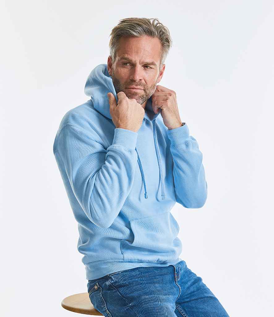 Russell Hooded Sweatshirt in by Russell — Custom branded clothing by Print Press, featuring premium embroidery produced in our specialist print lab in the UK.
