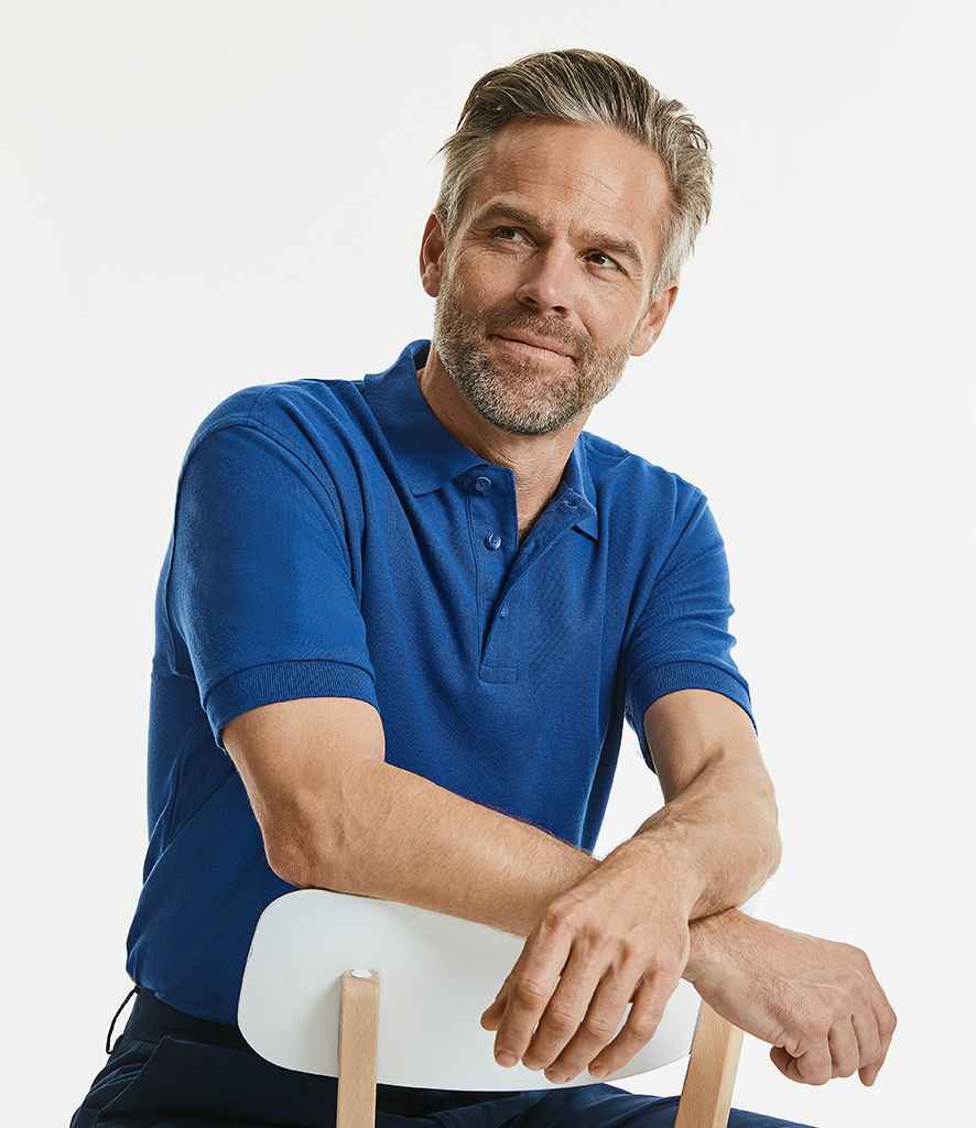 Russell Ultimate Cotton Piqué Polo Shirt in by Russell — Custom branded clothing by Print Press, featuring premium embroidery produced in our specialist print lab in the UK.