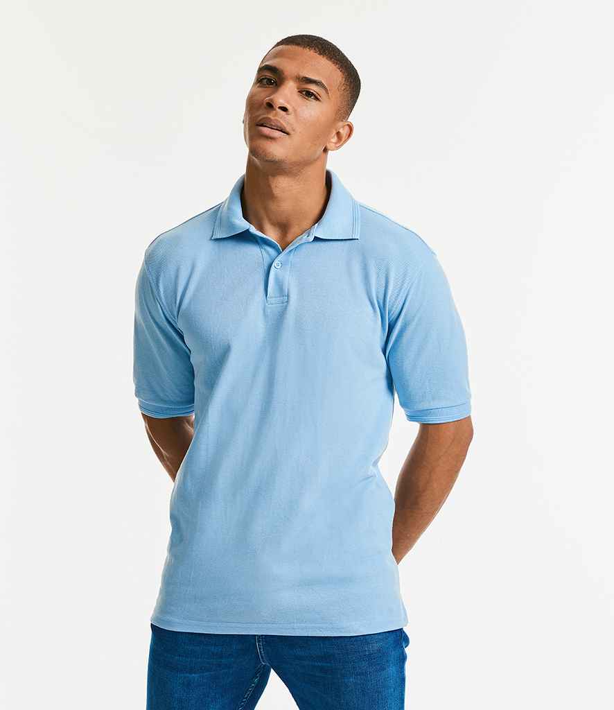 Russell Hardwearing Poly/Cotton Piqué Polo Shirt in by Russell — Custom branded clothing by Print Press, featuring premium embroidery produced in our specialist print lab in the UK.