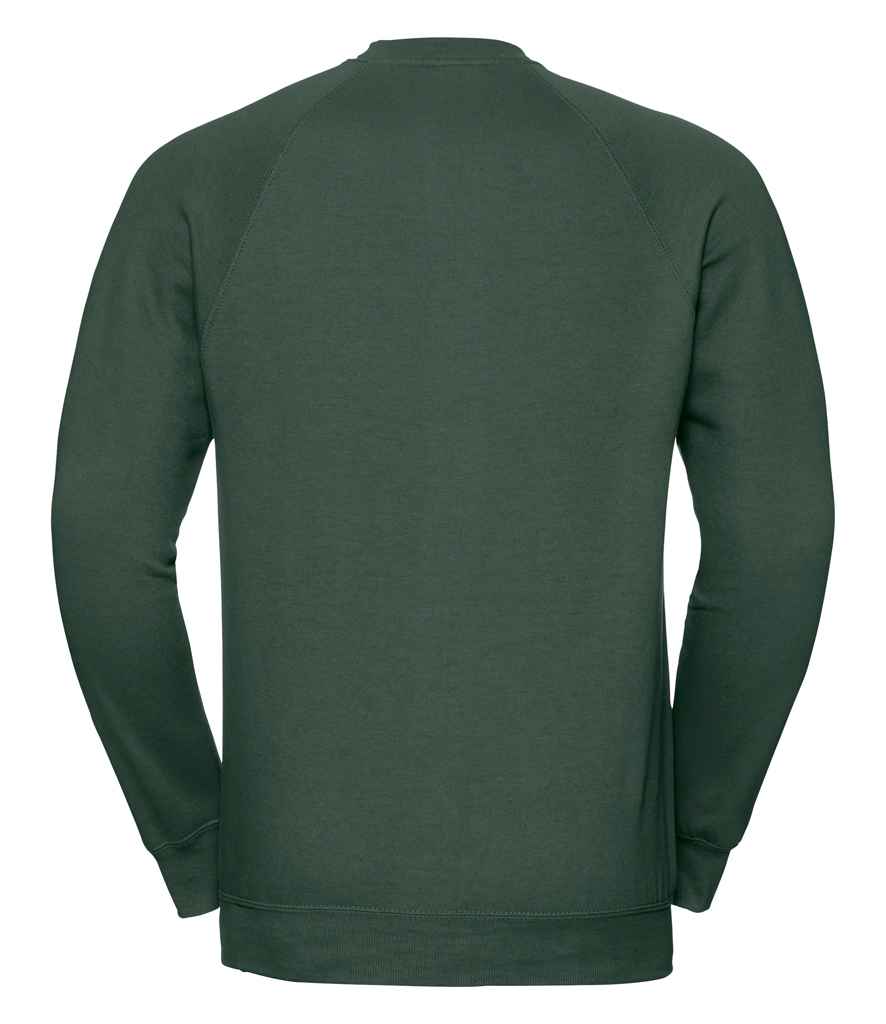 Russell Raglan Sweatshirt in by Russell — Custom branded clothing by Print Press, featuring premium embroidery produced in our specialist print lab in the UK.