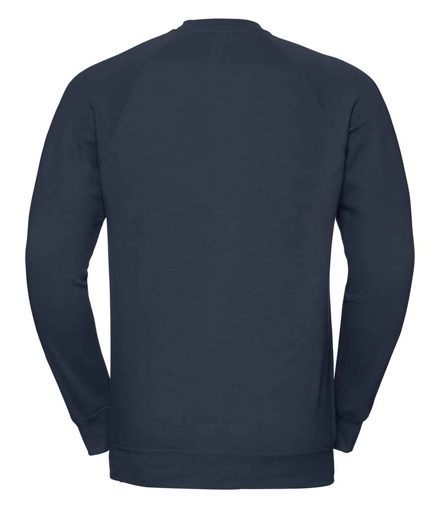Russell Raglan Sweatshirt in by Russell — Custom branded clothing by Print Press, featuring premium embroidery produced in our specialist print lab in the UK.