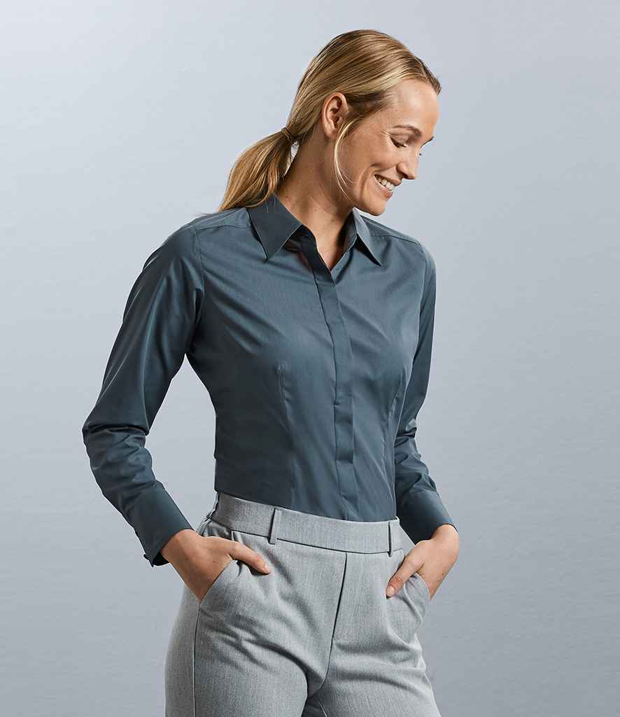 Russell Collection Ladies Long Sleeve Fitted Poplin Shirt in by Russell — Custom branded clothing by Print Press, featuring premium embroidery produced in our specialist print lab in the UK.