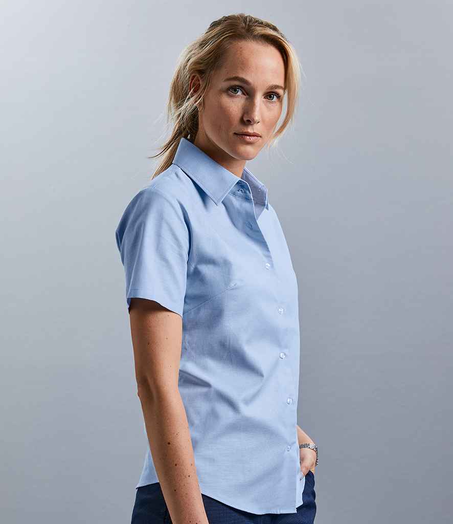 Russell Collection Ladies Short Sleeve Easy Care Oxford Shirt in by Russell — Custom branded clothing by Print Press, featuring premium embroidery produced in our specialist print lab in the UK.