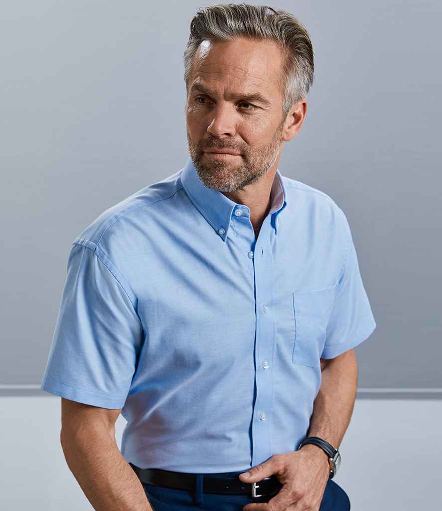 Russell Collection Short Sleeve Easy Care Oxford Shirt in Oxford Blue by Russell — Custom branded clothing by Print Press, featuring premium embroidery produced in our specialist print lab in the UK.