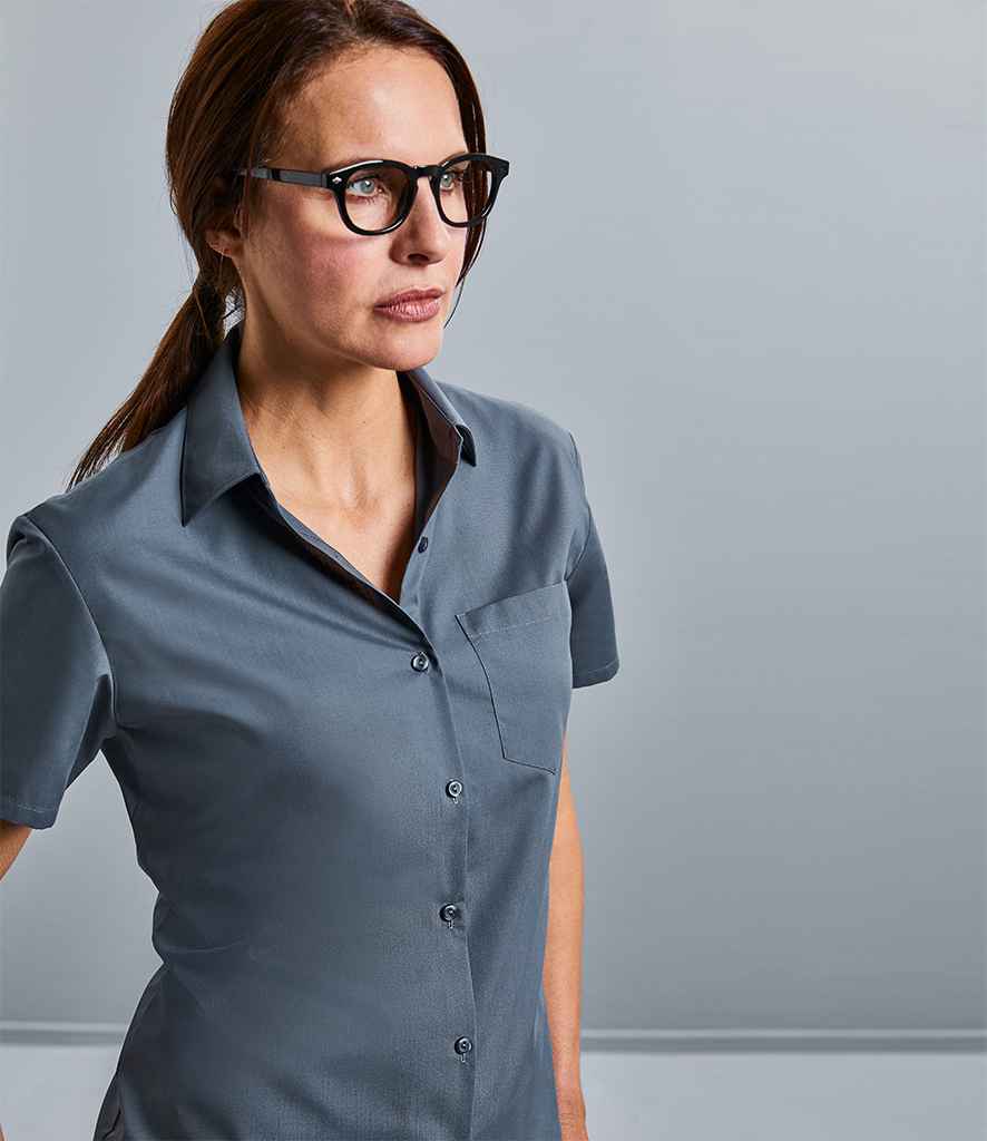 Russell Collection Ladies Short Sleeve Easy Care Poplin Shirt in by Russell — Custom branded clothing by Print Press, featuring premium embroidery produced in our specialist print lab in the UK.
