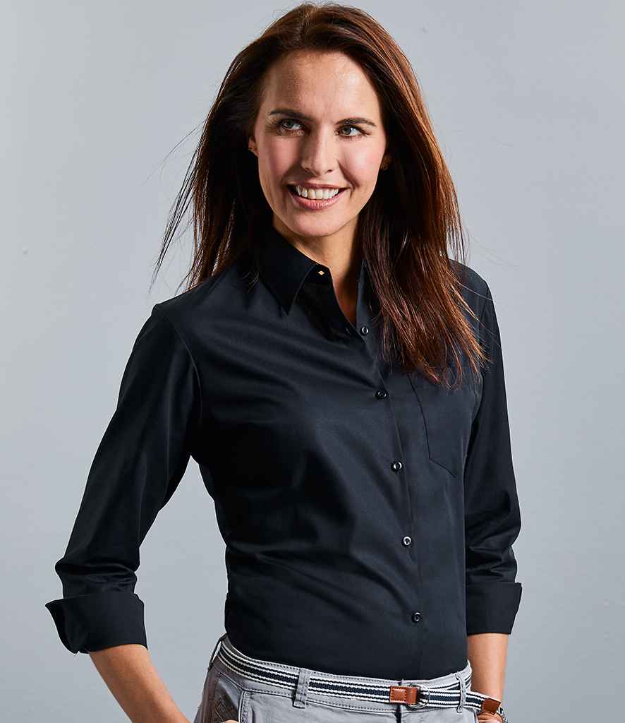 Russell Collection Ladies Long Sleeve Easy Care Cotton Poplin Shirt in Black by Russell — Custom branded clothing by Print Press, featuring premium embroidery produced in our specialist print lab in the UK.