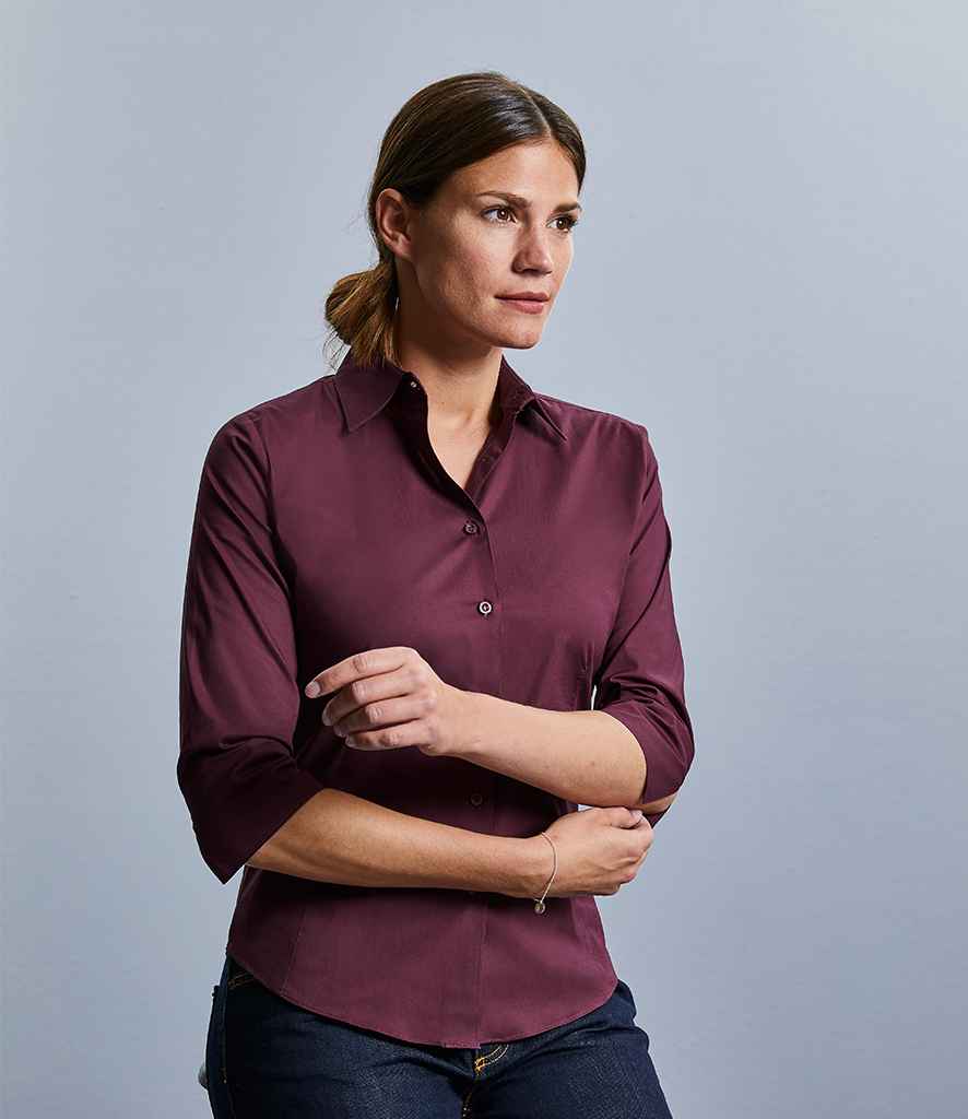 Russell Collection Ladies 3/4 Sleeve Easy Care Fitted Shirt in by Russell — Custom branded clothing by Print Press, featuring premium embroidery produced in our specialist print lab in the UK.