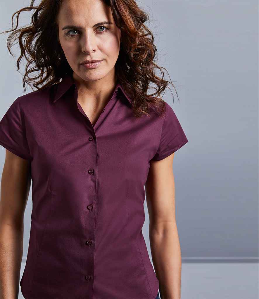 Russell Collection Ladies Short Sleeve Easy Care Fitted Shirt in by Russell — Custom branded clothing by Print Press, featuring premium embroidery produced in our specialist print lab in the UK.