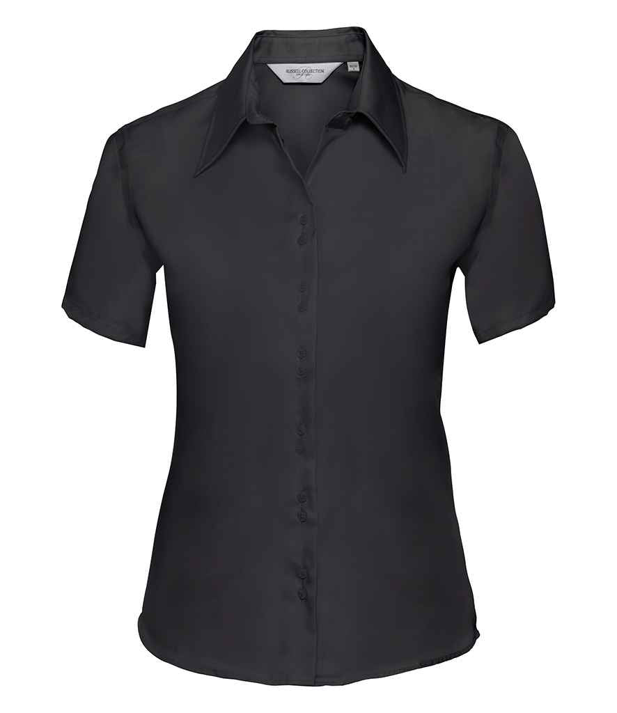 Russell Collection Ladies Short Sleeve Ultimate Non-Iron Shirt in Black by Russell — Custom branded clothing by Print Press, featuring premium embroidery produced in our specialist print lab in the UK.