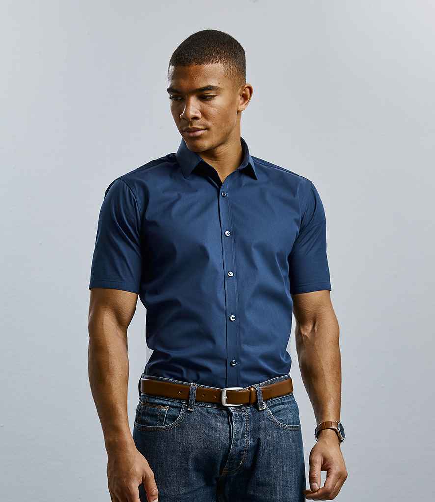 Russell Collection Ultimate Short Sleeve Stretch Shirt in by Russell — Custom branded clothing by Print Press, featuring premium embroidery produced in our specialist print lab in the UK.