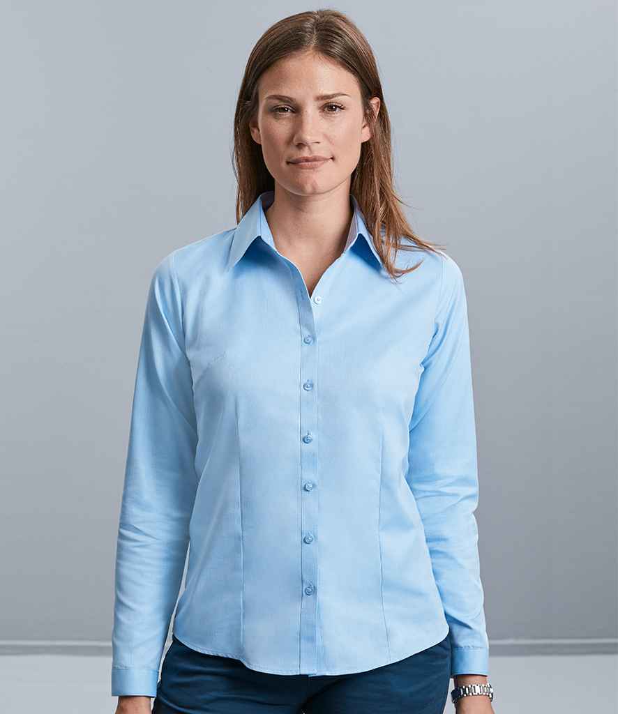 Russell Collection Ladies Long Sleeve Herringbone Shirt in Light Blue by Russell — Custom branded clothing by Print Press, featuring premium embroidery produced in our specialist print lab in the UK.