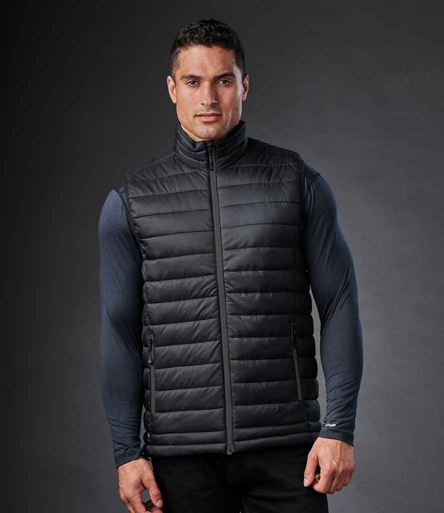 Stormtech Stavanger Thermal Bodywarmer in Black Graphite Grey by Stormtech — Custom branded clothing by Print Press, featuring premium embroidery produced in our specialist print lab in the UK.