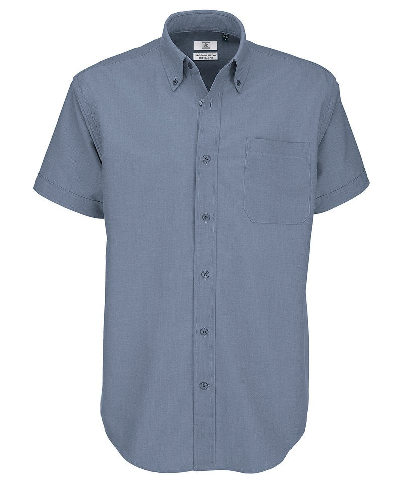 B&C Oxford Short Sleeve Men's in Silver Moon by B & C Collection — Custom branded clothing by Print Press, featuring premium embroidery produced in our specialist print lab in the UK.
