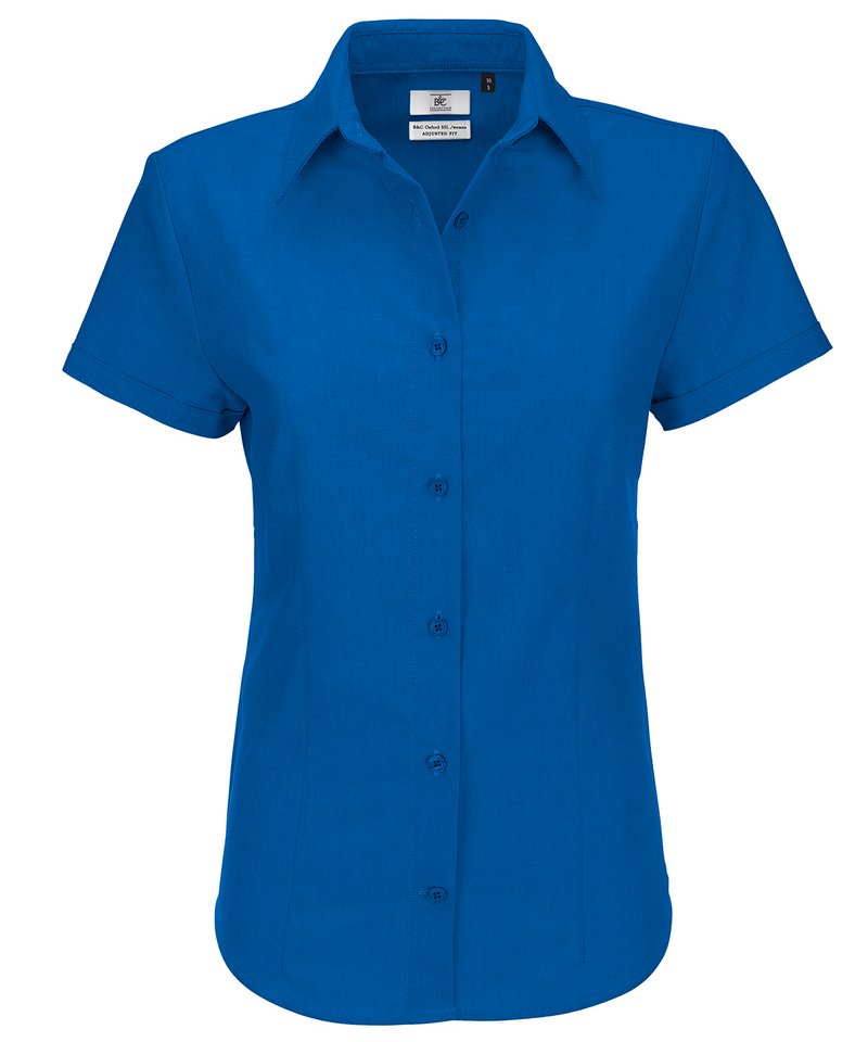 B&C Oxford Short Sleeve Women's in Blue Chip by B & C Collection — Custom branded clothing by Print Press, featuring premium embroidery produced in our specialist print lab in the UK.