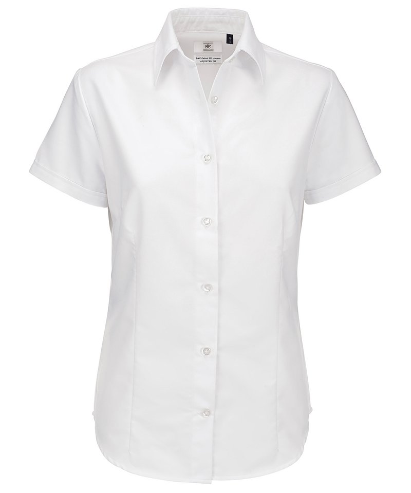 B&C Oxford Short Sleeve Women's in White by B & C Collection — Custom branded clothing by Print Press, featuring premium embroidery produced in our specialist print lab in the UK.
