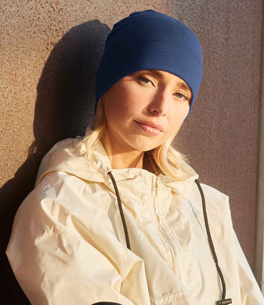 Beechfield Merino Beanie in ONE Steel Blue by Beechfield — Custom branded clothing by Print Press, featuring premium embroidery produced in our specialist print lab in the UK.