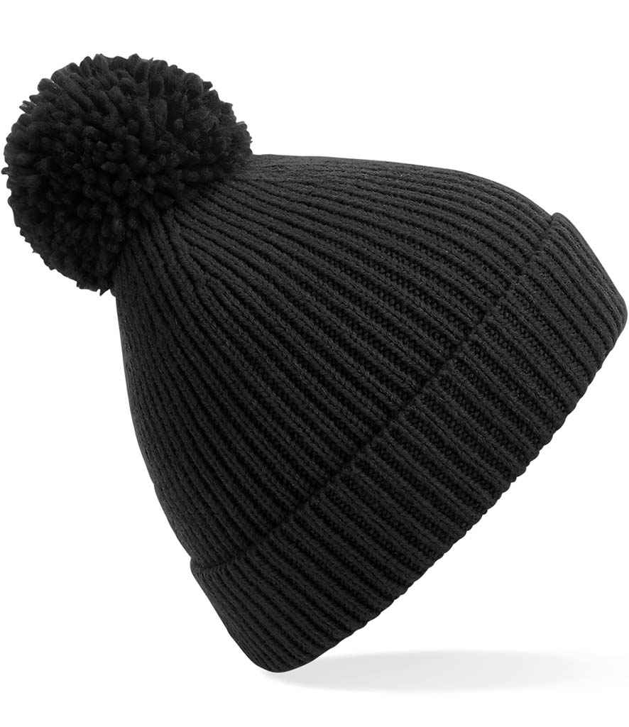 Beechfield Engineered Knit Ribbed Pom Pom Beanie in ONE Black by Beechfield — Custom branded clothing by Print Press, featuring premium embroidery produced in our specialist print lab in the UK.