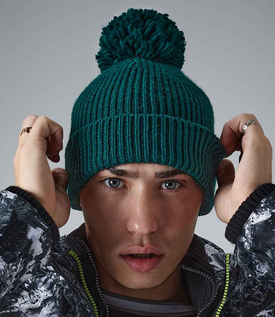Beechfield Engineered Knit Ribbed Pom Pom Beanie in ONE Bottle Green by Beechfield — Custom branded clothing by Print Press, featuring premium embroidery produced in our specialist print lab in the UK.