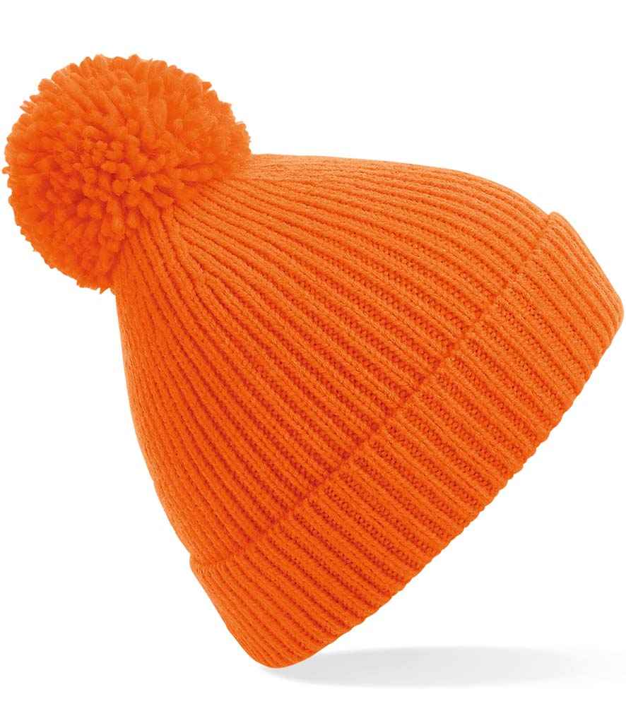 Beechfield Engineered Knit Ribbed Pom Pom Beanie in ONE Orange by Beechfield — Custom branded clothing by Print Press, featuring premium embroidery produced in our specialist print lab in the UK.