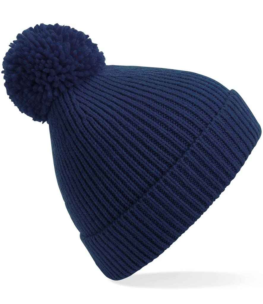 Beechfield Engineered Knit Ribbed Pom Pom Beanie in ONE Oxford Navy by Beechfield — Custom branded clothing by Print Press, featuring premium embroidery produced in our specialist print lab in the UK.