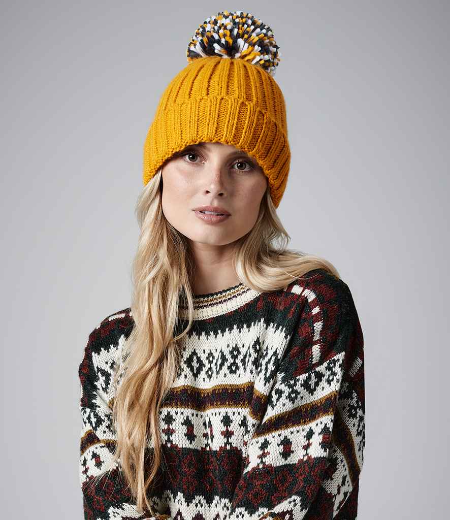 Beechfield Hygge Beanie in ONE Mustard by Beechfield — Custom branded clothing by Print Press, featuring premium embroidery produced in our specialist print lab in the UK.