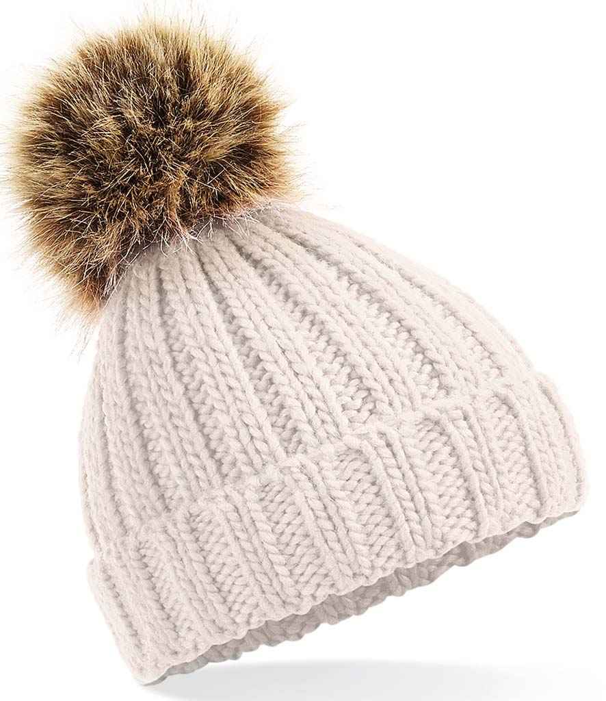 Beechfield Infant Faux Fur Pom Pom Chunky Beanie in ONE Oatmeal by Beechfield — Custom branded clothing by Print Press, featuring premium embroidery produced in our specialist print lab in the UK.