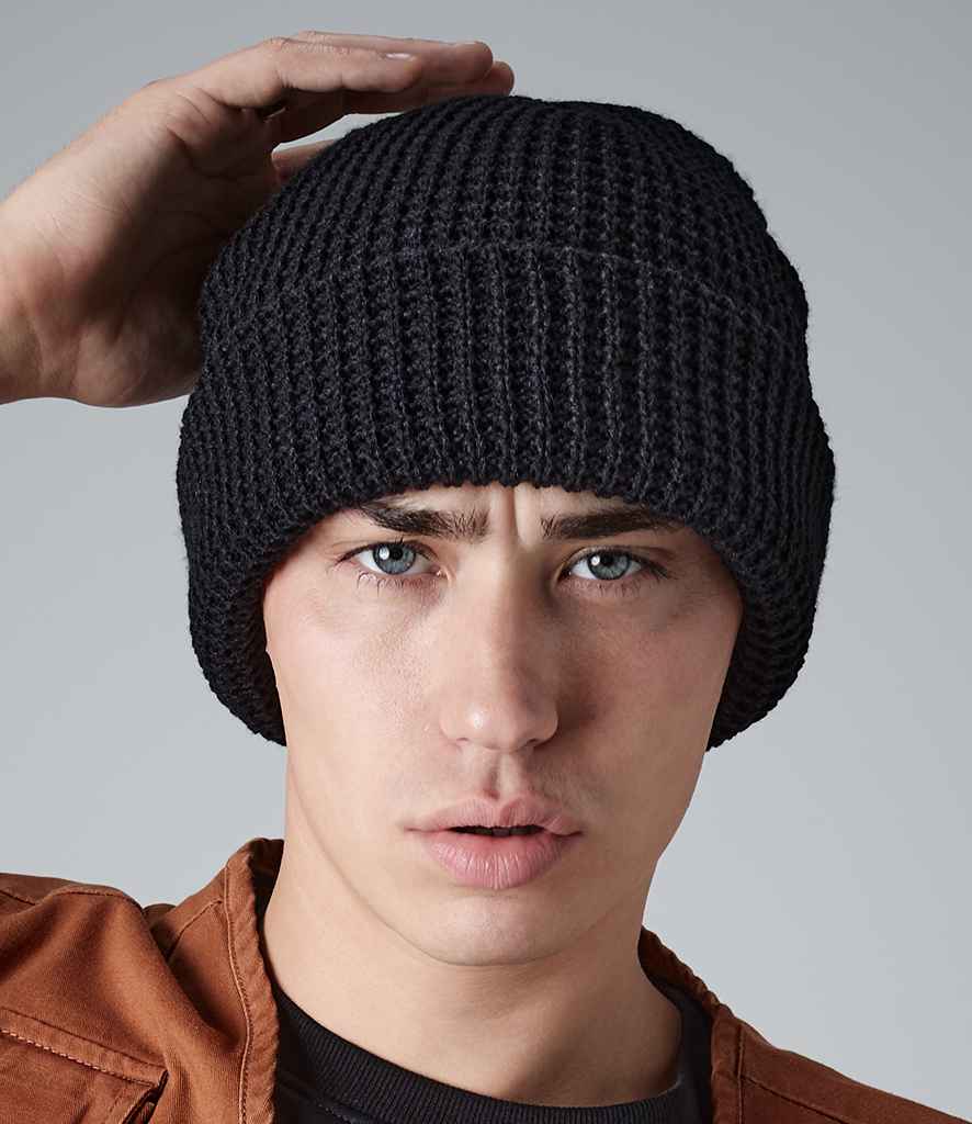 Beechfield Classic Waffle Knit Beanie in ONE Black by Beechfield — Custom branded clothing by Print Press, featuring premium embroidery produced in our specialist print lab in the UK.