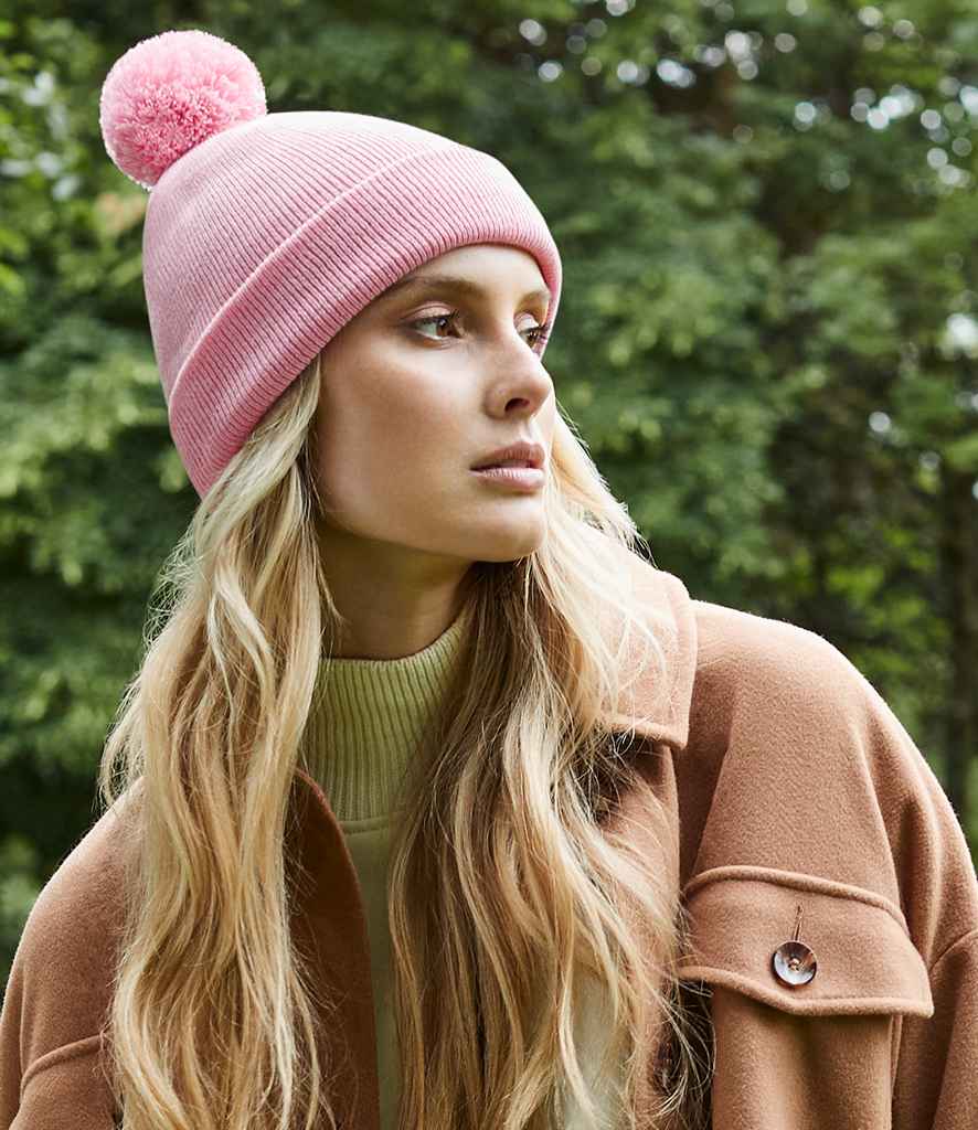 Beechfield Original Pom Pom Beanie in ONE Dusky Pink by Beechfield — Custom branded clothing by Print Press, featuring premium embroidery produced in our specialist print lab in the UK.