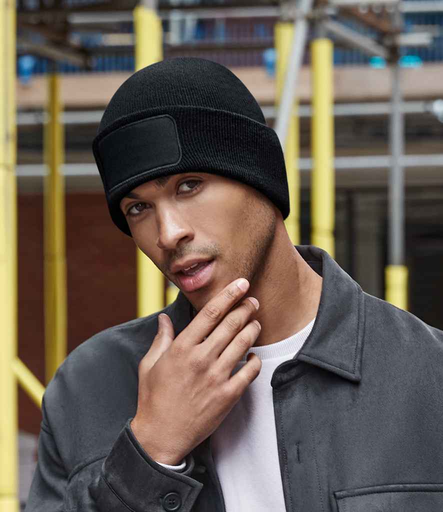 Beechfield Recycled Original Patch Beanie in ONE Black by Beechfield — Custom branded clothing by Print Press, featuring premium embroidery produced in our specialist print lab in the UK.