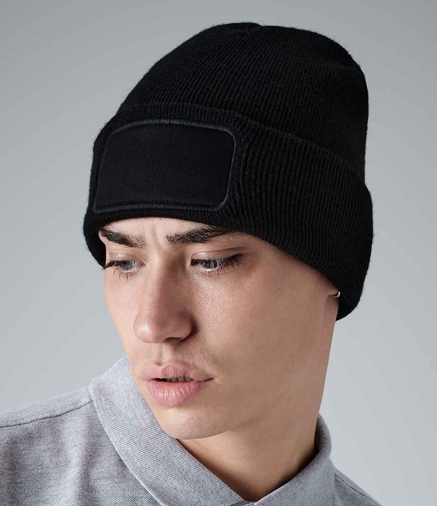 Beechfield Original Patch Beanie in ONE Black by Beechfield — Custom branded clothing by Print Press, featuring premium embroidery produced in our specialist print lab in the UK.