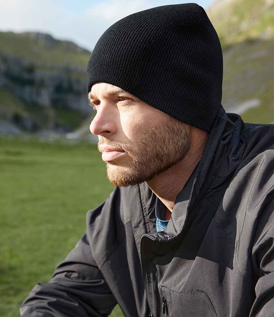 Beechfield Recycled Original Pull-On Beanie in ONE Black by Beechfield — Custom branded clothing by Print Press, featuring premium embroidery produced in our specialist print lab in the UK.