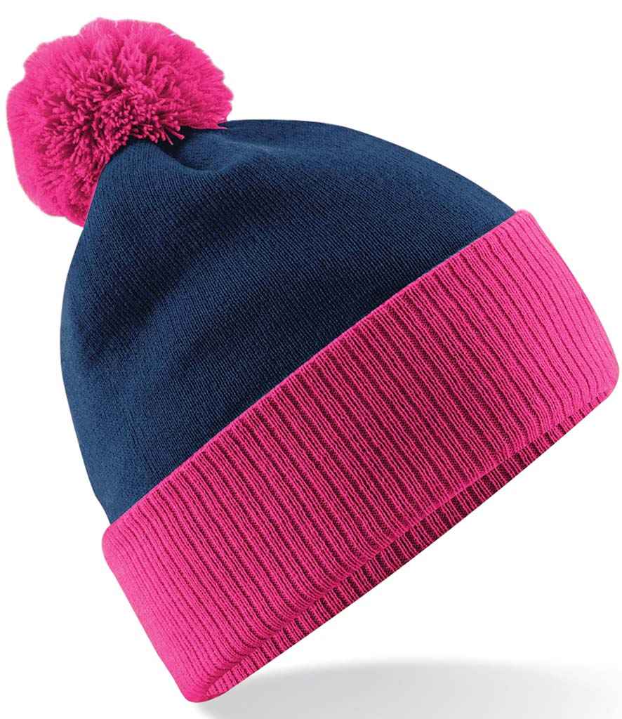 Beechfield Snowstar® Two Tone Beanie in ONE French Navy Fuchsia by Beechfield — Custom branded clothing by Print Press, featuring premium embroidery produced in our specialist print lab in the UK.