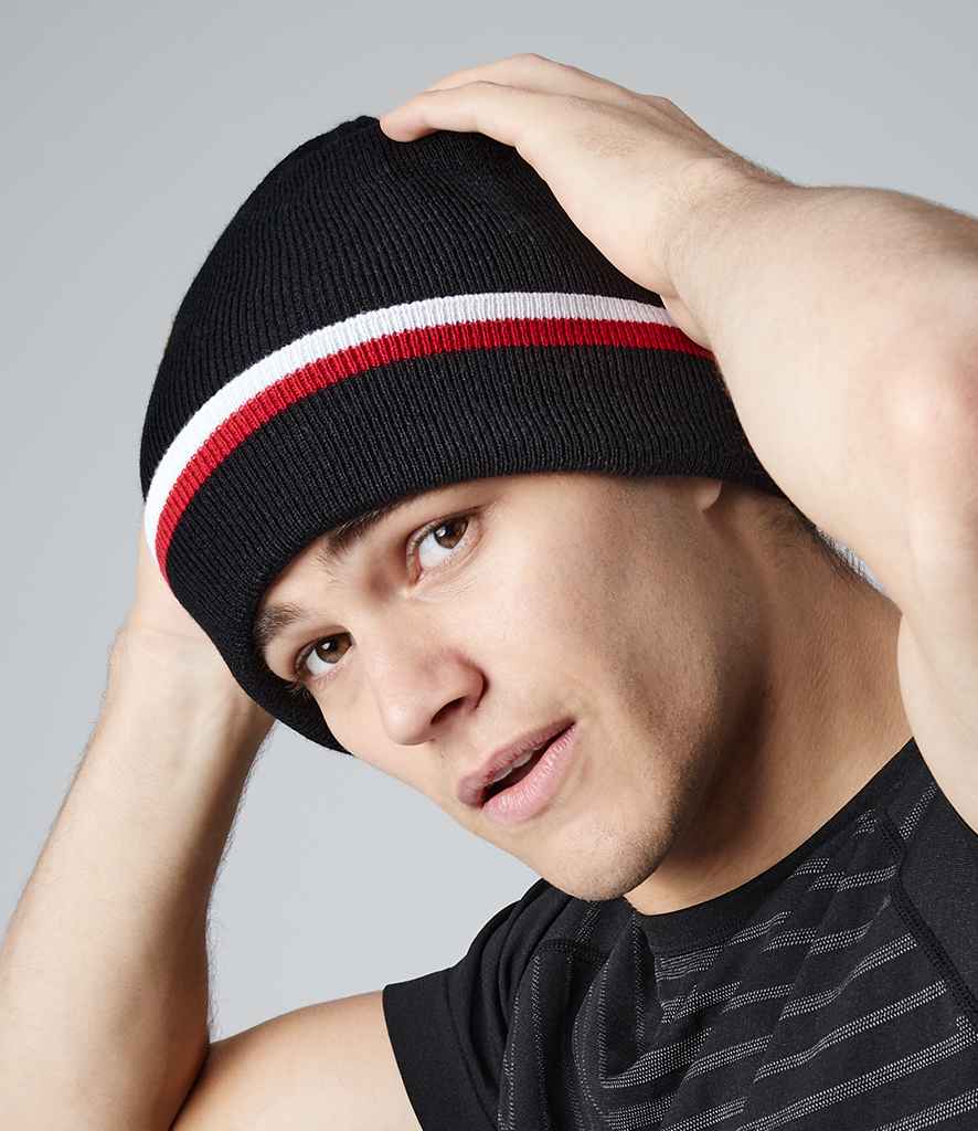 Beechfield Teamwear Beanie in ONE Black Classic Red White by Beechfield — Custom branded clothing by Print Press, featuring premium embroidery produced in our specialist print lab in the UK.