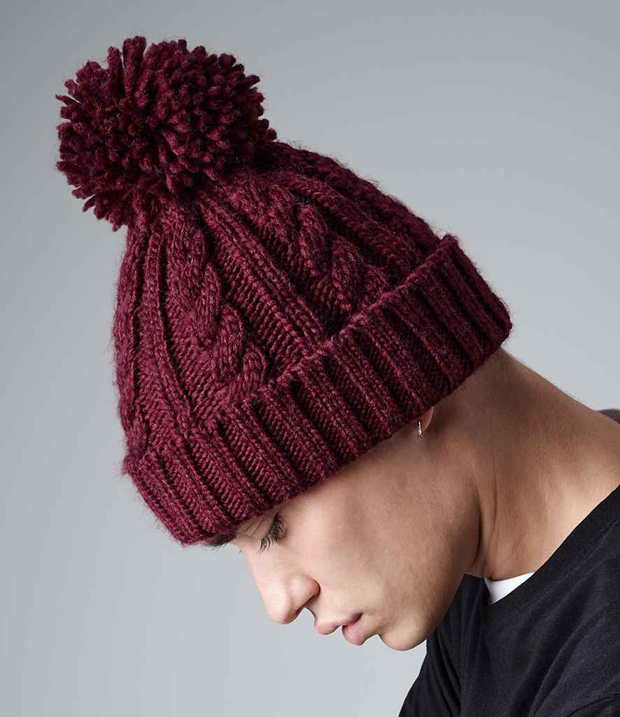 Beechfield Cable Knit Melange Beanie in ONE Burgundy by Beechfield — Custom branded clothing by Print Press, featuring premium embroidery produced in our specialist print lab in the UK.