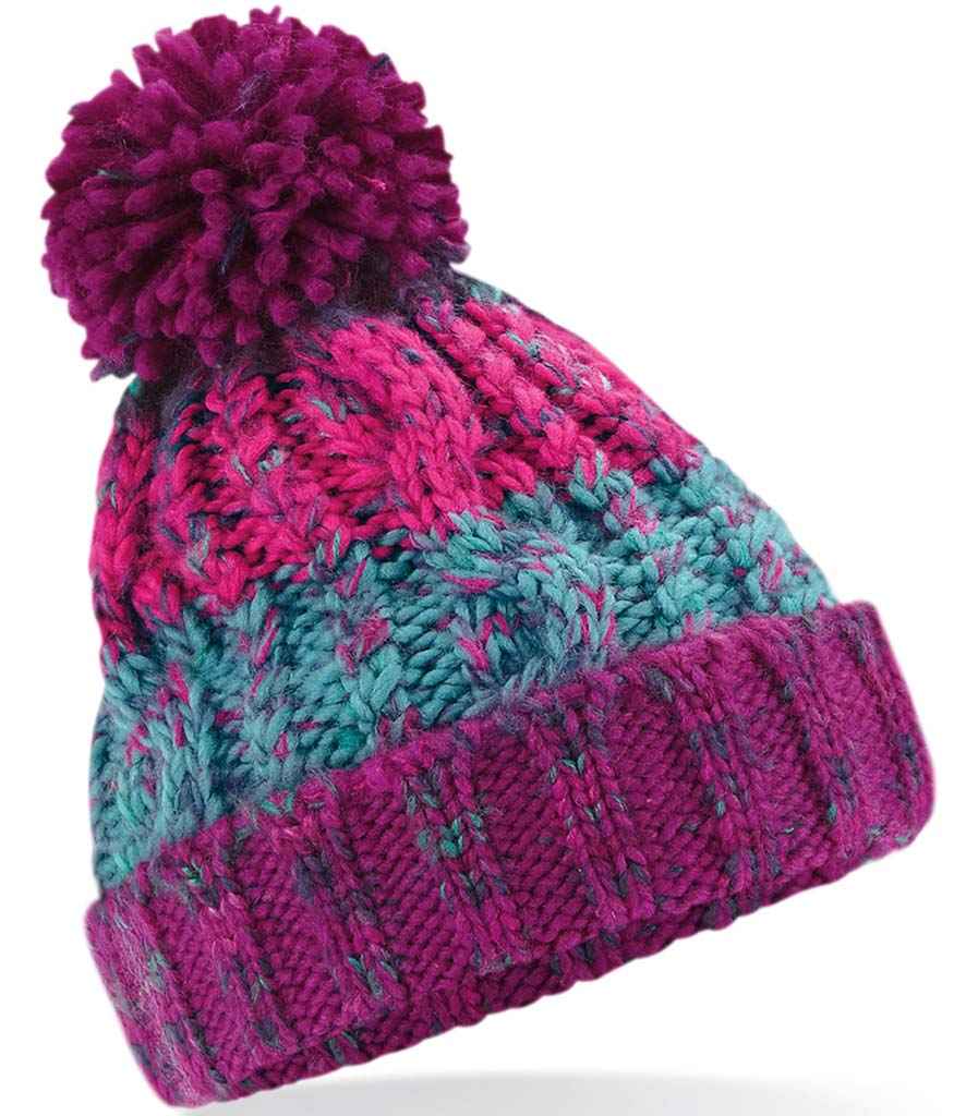 Beechfield Junior Corkscrew Pom Pom Beanie in ONE Winter Berries by Beechfield — Custom branded clothing by Print Press, featuring premium embroidery produced in our specialist print lab in the UK.